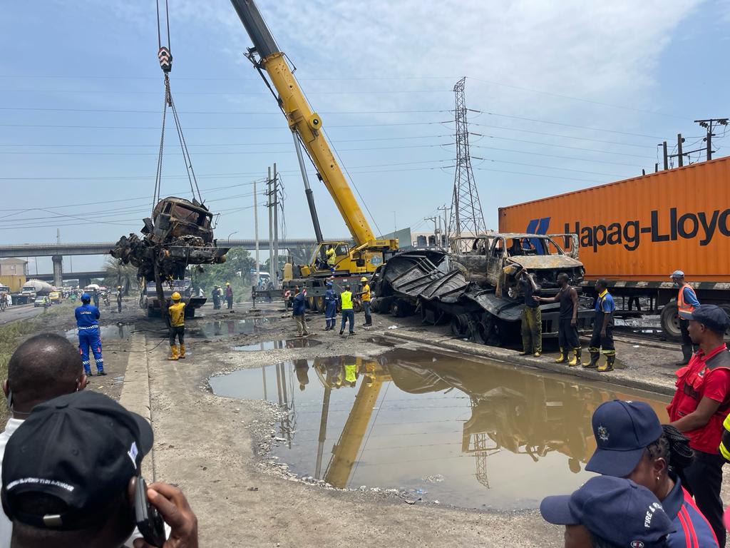 Men of the Lagos State Emergency Management Agency, LASEMA removing wreckages from the tanker fire incident at Ijora/Apapa on Friday, 13 October 2023