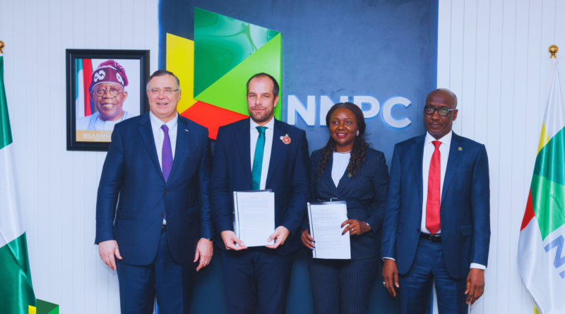 R-L: Executive Vice President, Upstream, NNPC Ltd., Oritsemeyiwa Eyesan and Managing Director and Country Chair, TotalEnergies EP Nigeria, Matthieu Bouyer, sign an MoU between NNPC Ltd. and TotalEnergies on the use of the latter’s Airborne Ultralight Spectrometer for Environment Detection (AUSEA) Technology, aimed at detecting and monitoring methane emissions in oil and gas operations. Watching with keen interest are the Group Chief Executive Officer of NNPC Ltd., Mele Kyari (standing right) and Chairman and Chief Executive Officer of TotalEnergies, Patrick Pouyanné (standing left).